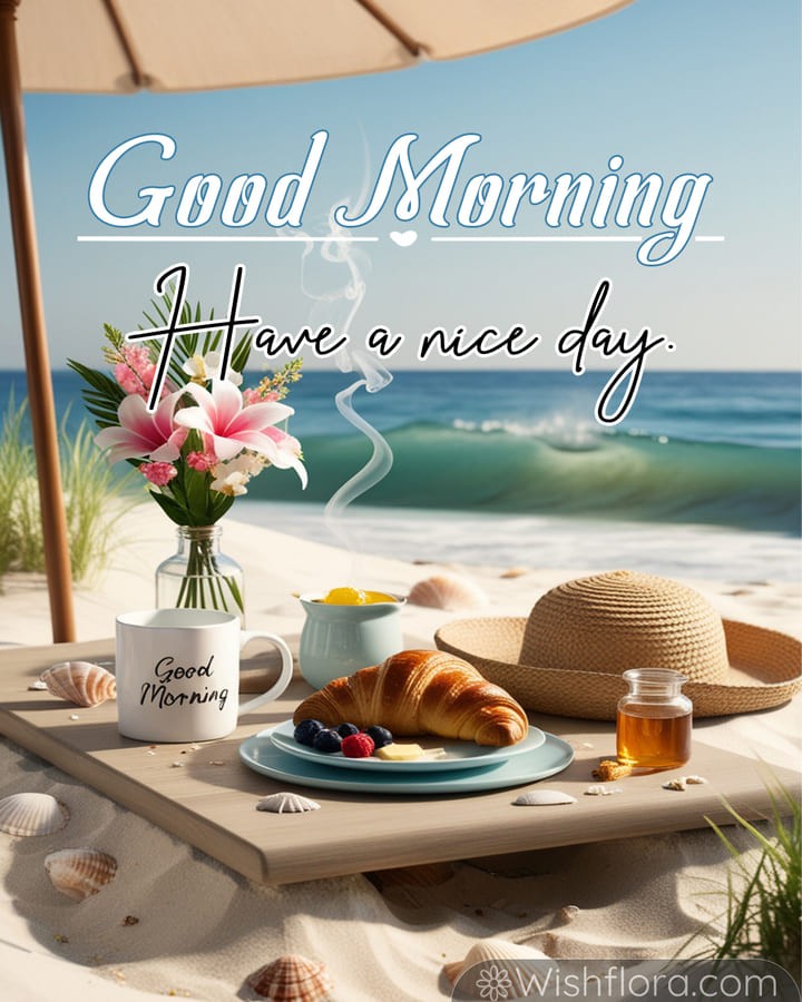 Peaceful Good Morning Images of a beach breakfast with a steaming mug, golden croissant, fresh berries, honey, pink lilies, and the golden morning light by the shore, spreading serene good morning blessings.