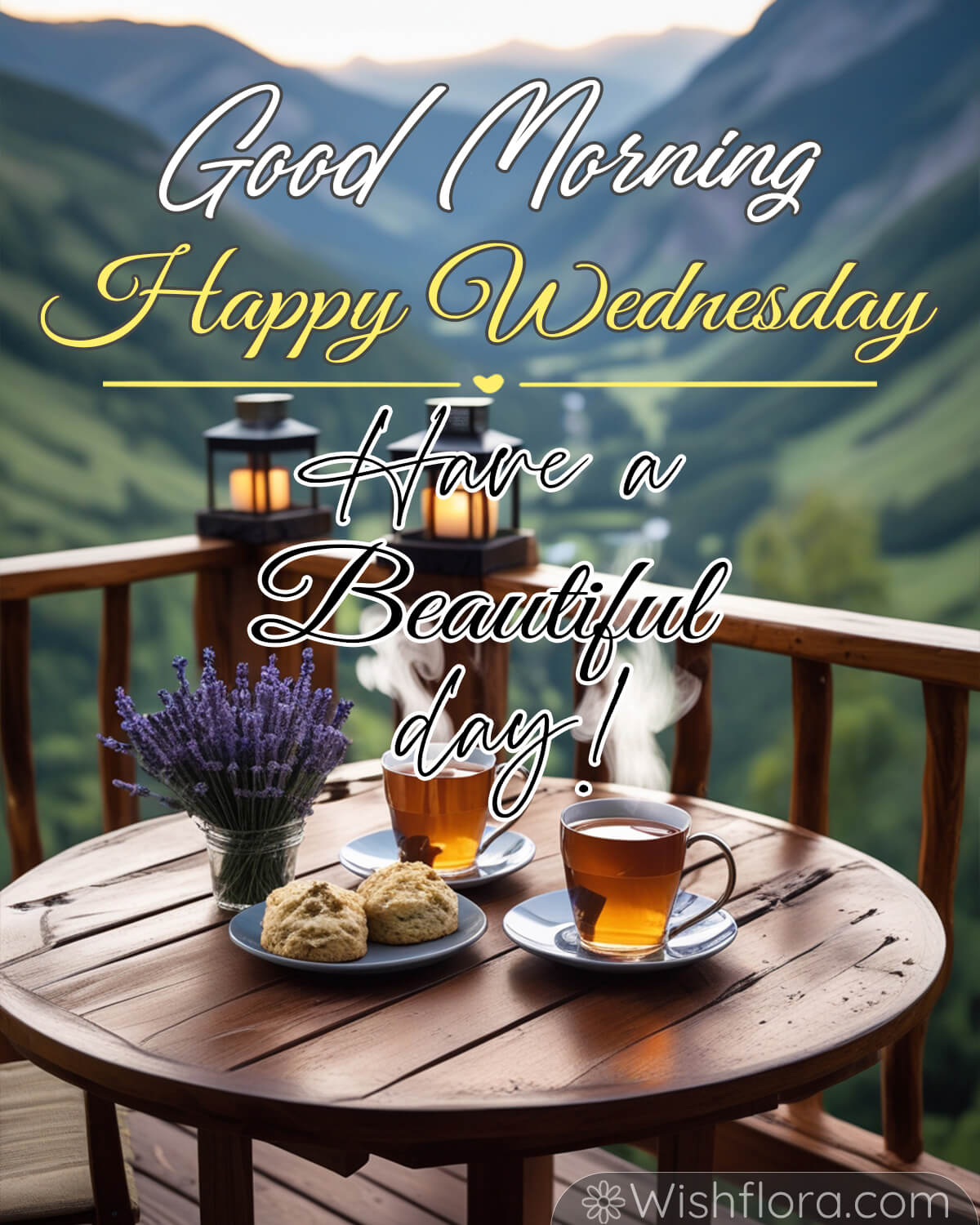 A cozy balcony overlooking a lush mountain view with a wooden table holding two cups of tea, lavender flowers in a vase, biscuits on plates, and lanterns. Text reads: Good Morning, Happy Wednesday, Have a Beautiful Day.